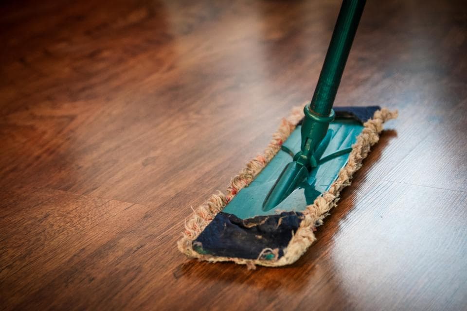 Hardwood floor freshly cleaned with a microfiber mop